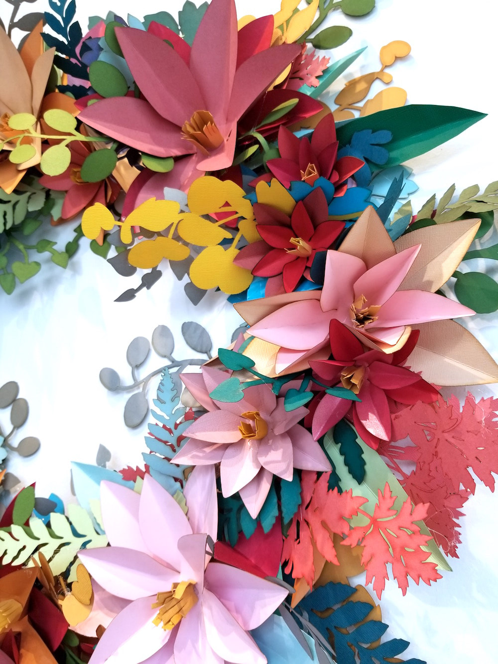 cut paper floral wreath by Embellishments Studio