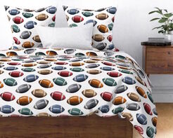 Football Bedding using fabric by Aaron Christensen.  Available from Spoonflower.com