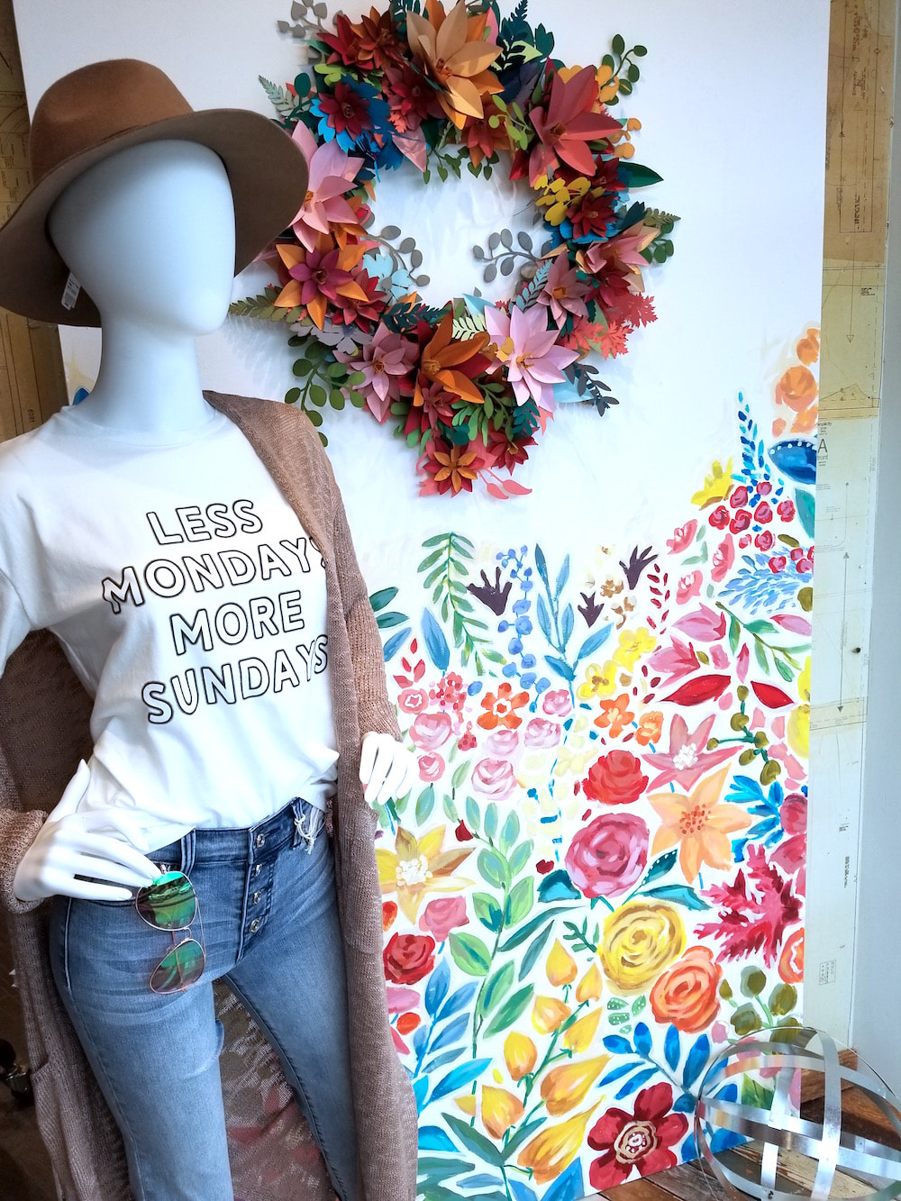 Spring Window Display featuring cut paper florals